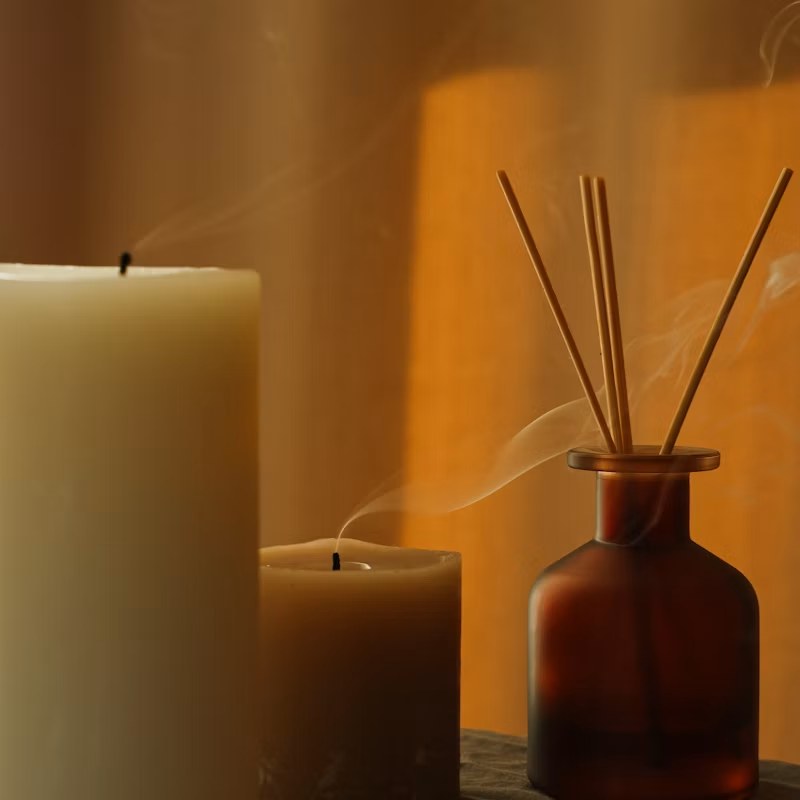 Warm candlelight in the treatment room
